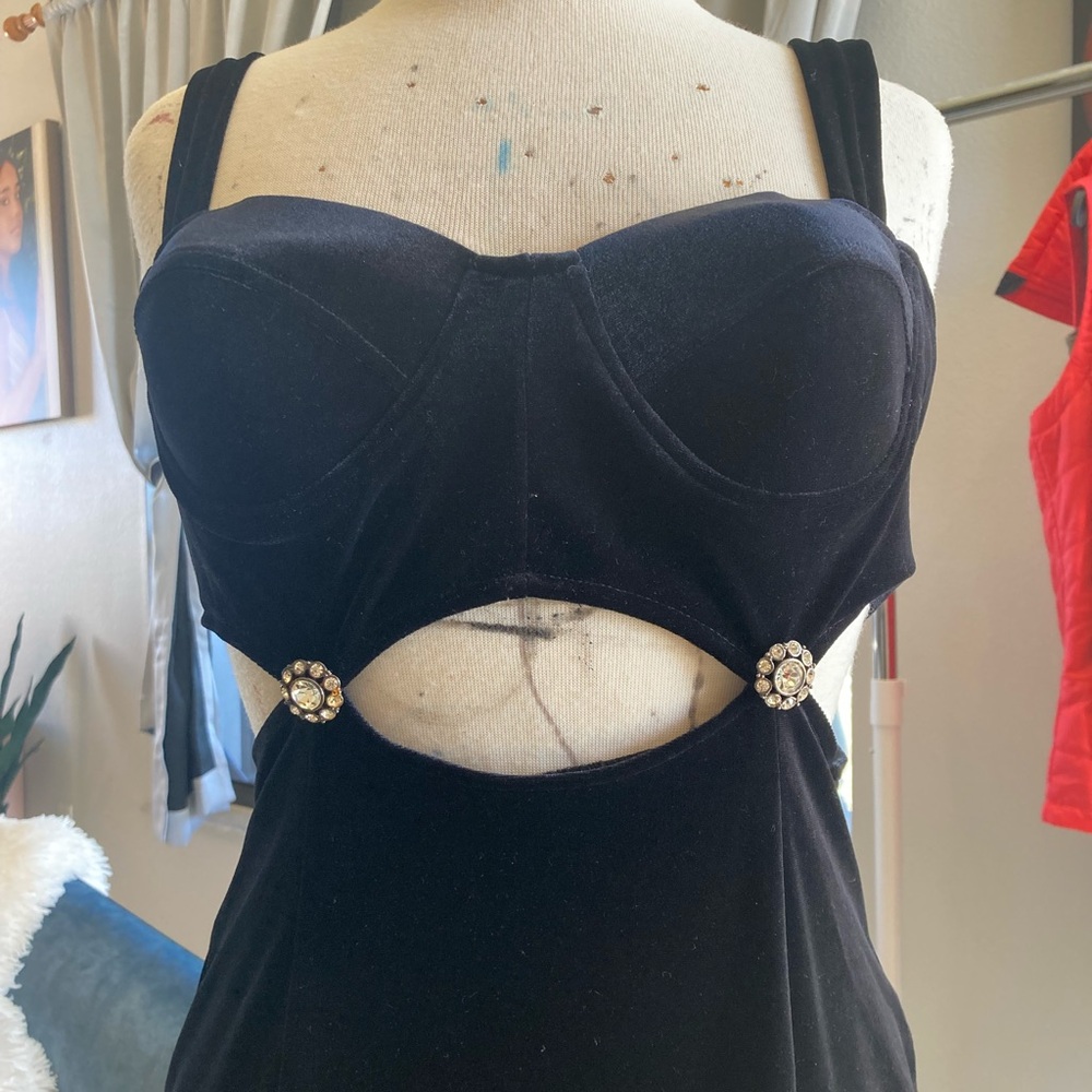 Black long dress with spilt on the side brand new with tags. Size is large.